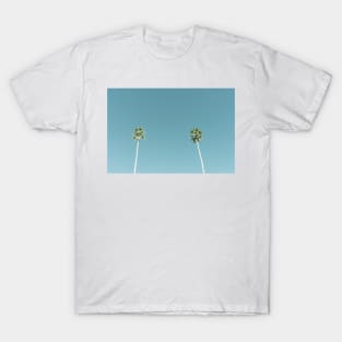 Tall fan palm trees against blue sky T-Shirt